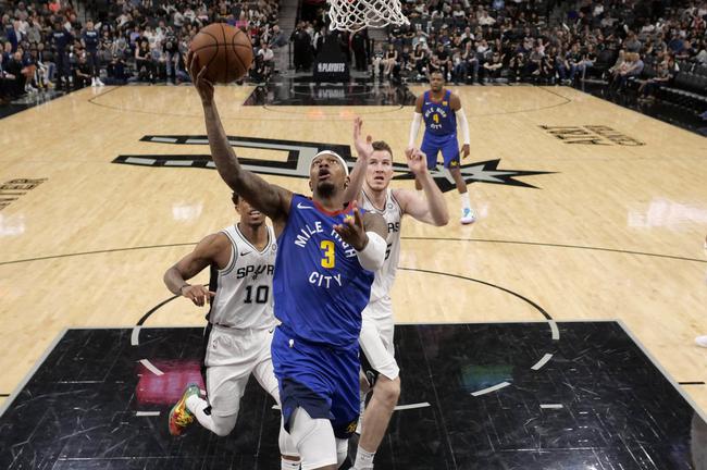 悟空体育-马刺客场惨败掘金,遭遇重大失利